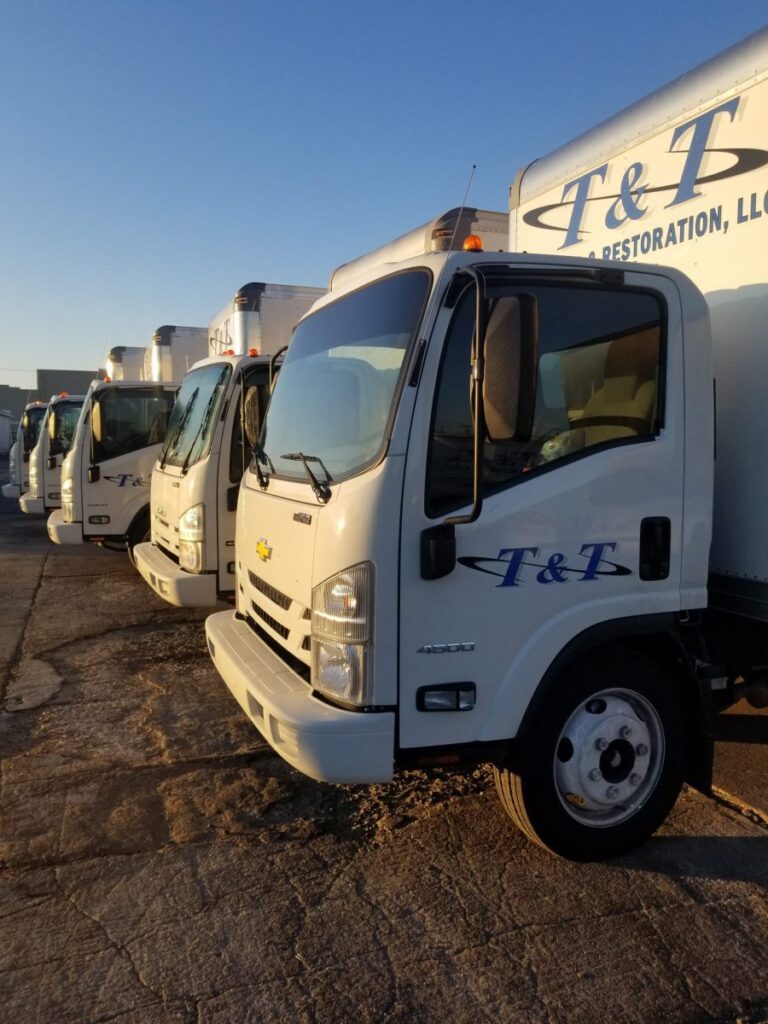 T and T Cleaning and Restoration trucks